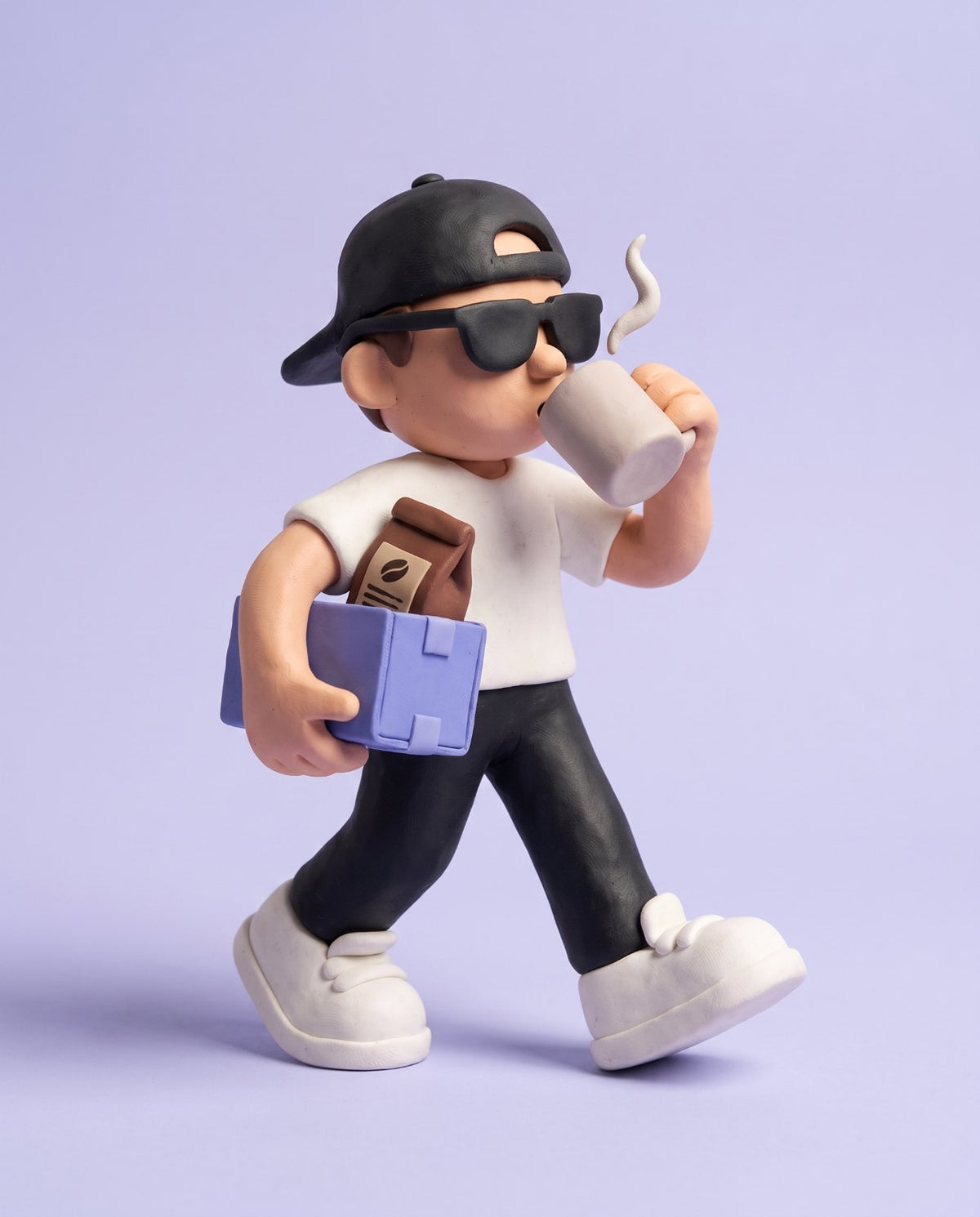 Clay Mello strolling with a subscription box under his arm